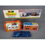 Yonezawa Diapet; Tomica Dandy - Three boxed and one unboxed Japanese diecast vehicles.