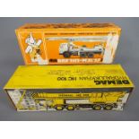 NZG, Conrad - Two boxed diecast construction vehicles.
