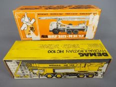 NZG, Conrad - Two boxed diecast construction vehicles.