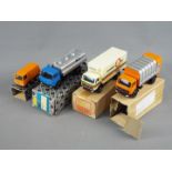 Conrad - Four boxed diecast vehicles.