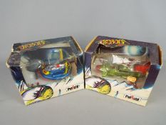 Polistil - Two boxed and unusual diecast 'Ufobots' from Polistil.