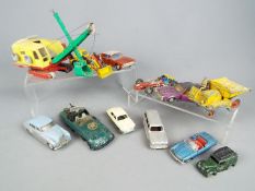 Dinky Toys, Spot-On - 12 unboxed diecast vehicles.