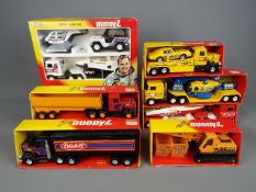 Buddy L - A collection of seven boxed vintage tinplate and plastic vehicles by Buddy L.
