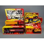 Buddy L - A collection of seven boxed vintage tinplate and plastic vehicles by Buddy L.