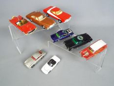 Corgi Toys - Eight unboxed diecast TV & Film related vehicles.
