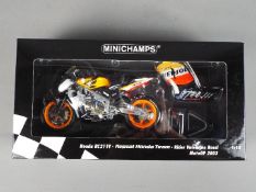 Minichamps - a 1:12 scale diecast model Honda RC211V, Repsol Honda Team,