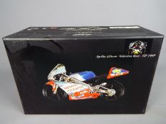 Minichamps Valentino Rossi - a 1:12 scale diecast model, Aprilia 125cc, GP 1997,