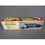 Yonezawa Diapet - A boxed 1:50 scale diecast T92 Mac Auto Transporter by the Japanese manufacturer