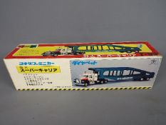 Yonezawa Diapet - A boxed 1:50 scale diecast T92 Mac Auto Transporter by the Japanese manufacturer