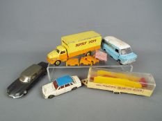 Dinky Toys - Four unboxed and desirable Dinky Toys.