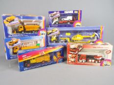 Siku - A group of six boxed diecast vehicles by Siku.