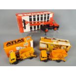 Conrad - Three boxed diecast vehiclesLot includes #3055 Mercedes Atlas Skip Truck (has a broken