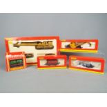 Hornby - Five boxed items of OO gauge rolling stock.