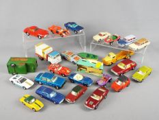 Corgi Toys, Dinky Toys, Matchbox - An unboxed collection of over 20 mainly Corgi diecast,