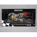 Minichamps - a 1:12 scale diecast model Honda RC211V, Repsol Honda Team,