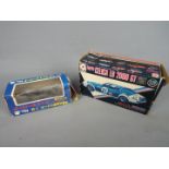 Sakura, Eidai Grip - Two interesting boxed Japanese diecast model cars.