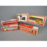 Yonezawa Diapet - Five boxed Japanese diecast vehicles by Yonezawa Diapet in various scales.