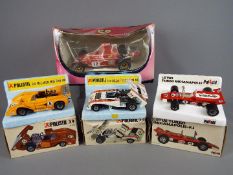 Polistil - Four boxed early Polistil diecast racing cars in different scales.