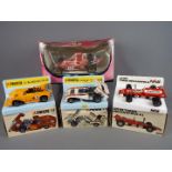 Polistil - Four boxed early Polistil diecast racing cars in different scales.