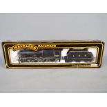 Mainline - an OO gauge locomotive and tender BR, Jubilee class, black livery,