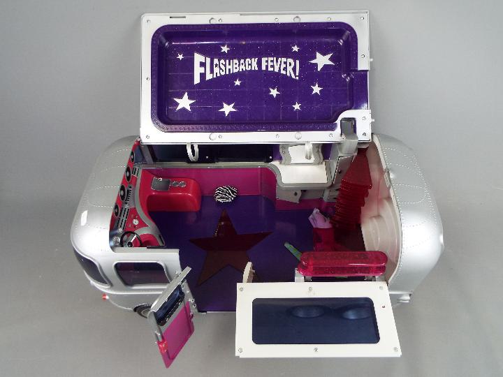 MGA Bratz - An unusual and unboxed Flashback Fever Silver Bratz Party Bus by MGA Entertainment.