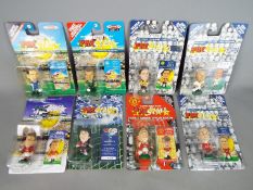 Corinthian - A collection of 8 carded Corinthian Pro Star Football Figures.