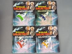 Laramie - An interesting lot containing 4 vintage 1978 carded diecast vehicles from the TV Series