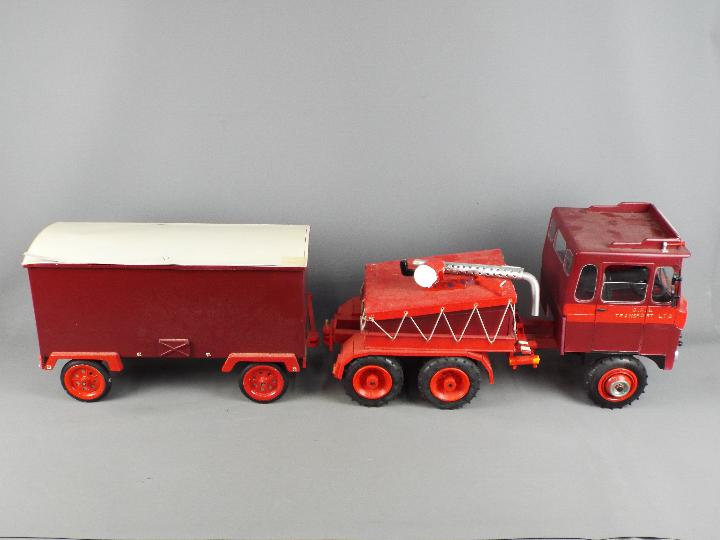 A scratch built plastic and wood model of a Foden Truck and Trailer.