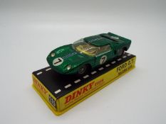 Dinky Toys - A boxed Dinky Toys #215 Ford GT. The model in metallic green with yellow interior, no.