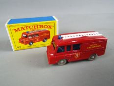 Matchbox by Lesney - Land Rover Fire Truck, red body, grey plastic wheels, rounded axles # 57,