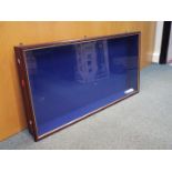A wooden wall mounted display cabinet with glass opening door and four glass shelves,