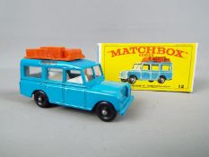 Matchbox by Lesney - Land Rover safari, blue body, black plastic wheels with rounded axles # 12,