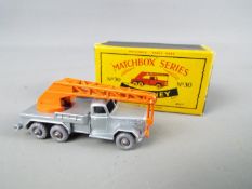 Matchbox by Lesney - Crane Truck Magirus-Deutz, metallic silver/grey body with orange crane,