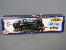 Bachmann - an OO gauge locomotive BR class 4 4-6-0 standard, green livery,