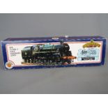 Bachmann - an OO gauge locomotive BR class 4 4-6-0 standard, green livery,