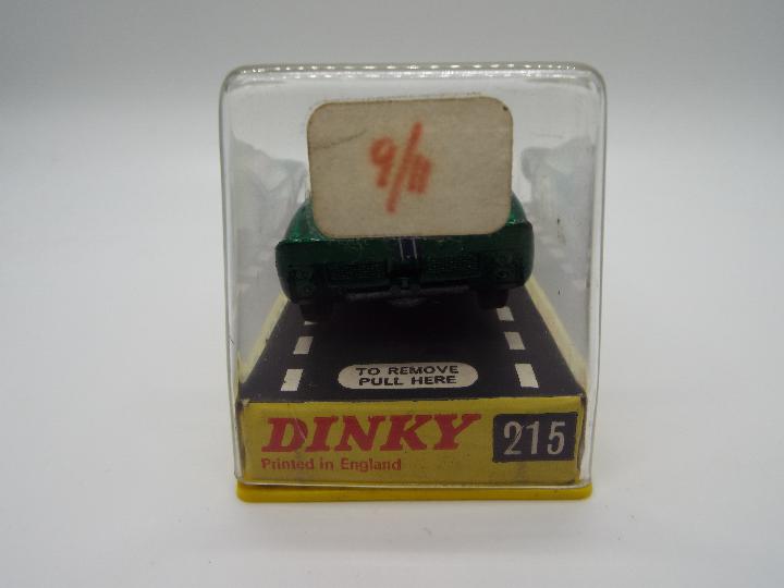 Dinky Toys - A boxed Dinky Toys #215 Ford GT. The model in metallic green with yellow interior, no. - Image 3 of 3