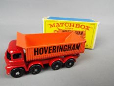 Matchbox by Lesney - Hoveringham 8-wheel Tipper Truck, red cab and chassis, orange tipper,