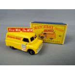 Matchbox by Lesney - Evening News Van, yellow body, black plastic wheels with rounded axles # 42,