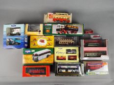 Matchbox, Corgi, and others - 13 boxed diecast and plastic model vehicles.