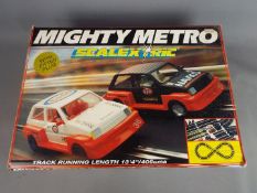 Scalextric - a boxed Scalextric mighty mini set.