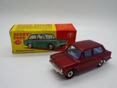 Dinky Toys - A boxed Dinky Toys #138 Hillman Imp Saloon.