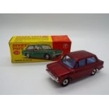 Dinky Toys - A boxed Dinky Toys #138 Hillman Imp Saloon.