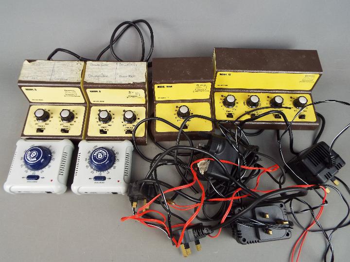 Model Railways - a box of six modern power controllers,