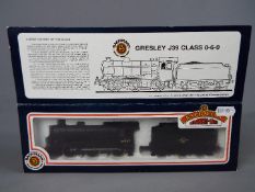 Bachmann - an OO gauge locomotive and tender BR black livery op no 64967, late crest # 31-852,