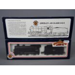 Bachmann - an OO gauge locomotive and tender BR black livery op no 64967, late crest # 31-852,