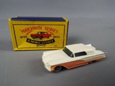 Matchbox, a Moko Lesney Product - Ford Thunderbird, pink and cream body, blue chassis,