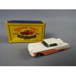 Matchbox, a Moko Lesney Product - Ford Thunderbird, pink and cream body, blue chassis,