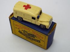 Matchbox Lesney - A boxed Matchbox RW #14 Daimler Ambulance.