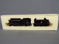 Hornby - an OO gauge 4-6-0 locomotive and tender, op no 44668 BR black livery,