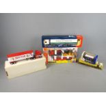 Joal, Matchbox, Tekno and others - Five boxed diecast vehicles in various scales.